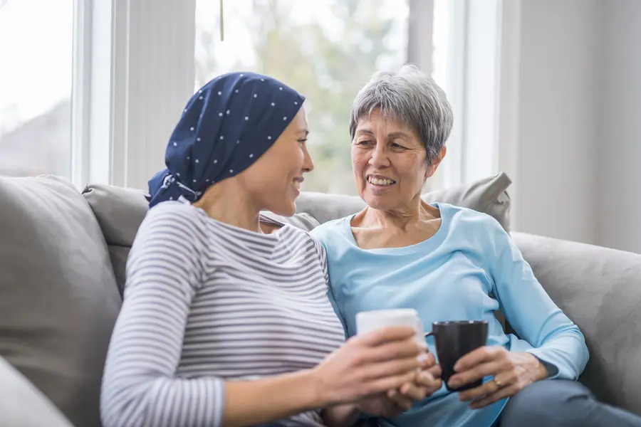 Caregiver supporting a loved one during cancer treatment